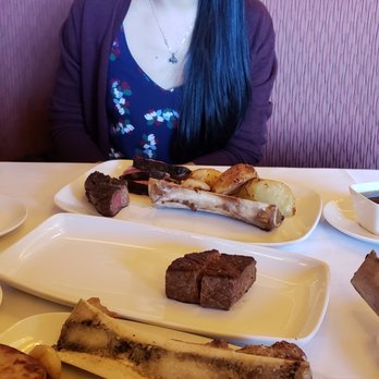 John Howie Steak Restaurant - The duck fat roasted potatoes is literally an entire potato cut in half. (Right before we tasted any of the meat) - Steakhouses Near Me - Bellevue, Washington John Howie Steak Restaurant - The duck fat roasted potatoes is literally an entire potato cut in half. (Right before we tasted any of the meat) - Steakhouses Near Me - Bellevue, Washington