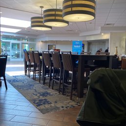 Dining and front desk area Dining and front desk area