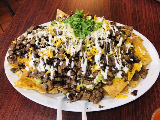 Photo of Chüyz Taco Shop - San Diego, CA, US. Carne Asada chips
