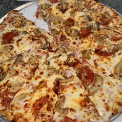 Pizzano's Pizza & Grinders Haines City - A large pepperoni pizza with extra cheese and mushrooms