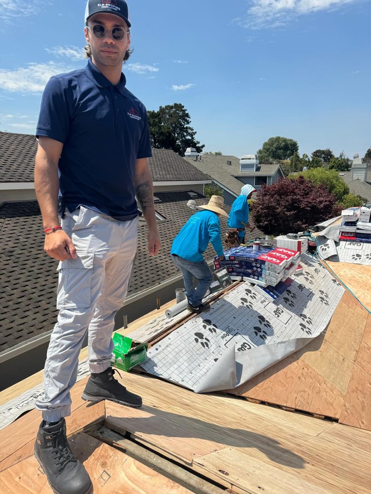 Slide of ELM Roofing Contractors