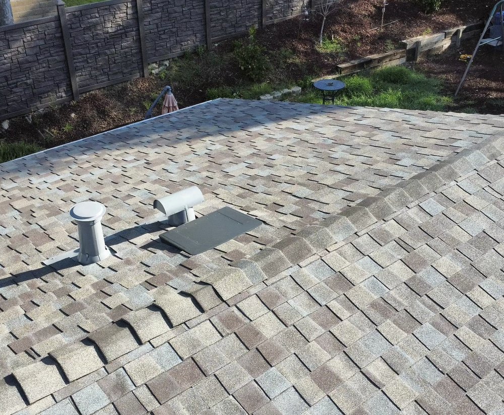 Slide of VIK Quality Roofing