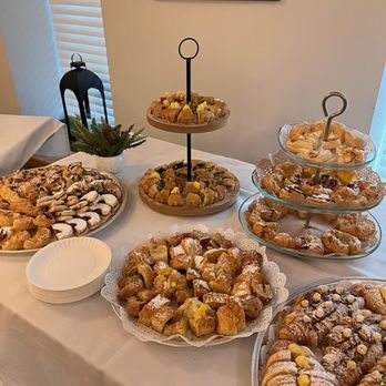 Tosca Italian Gourmet - a variety of pastries on a table - Italian Near Me - Spring, Texas Tosca Italian Gourmet - a variety of pastries on a table - Italian Near Me - Spring, Texas