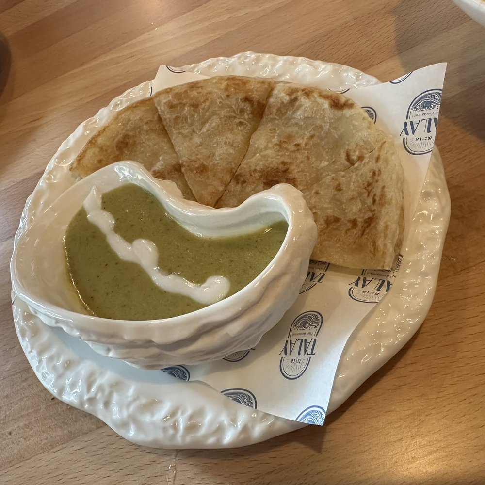 TALAY - Keaw Wan Roti (Pan-fried roti bread, green curry dipping sauce). DELICIOUS. - Thai Near Me - Orlando, Florida TALAY - Keaw Wan Roti (Pan-fried roti bread, green curry dipping sauce). DELICIOUS. - Thai Near Me - Orlando, Florida