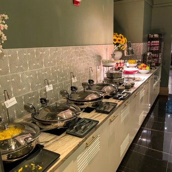 Dabble - a kitchen counter with a variety of cooking utensils - Bars Near Me - New York, New York Dabble - a kitchen counter with a variety of cooking utensils - Bars Near Me - New York, New York