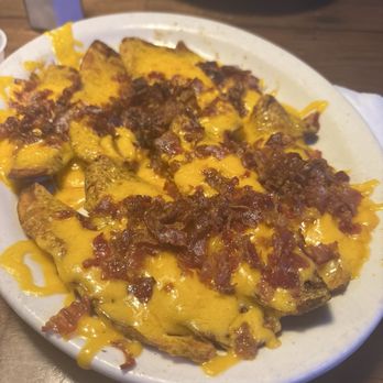 Texas Roadhouse - Loaded potato skins. With a side of ranch and sour cream. - Barbeque Near Me - Visalia, California Texas Roadhouse - Loaded potato skins. With a side of ranch and sour cream. - Barbeque Near Me - Visalia, California