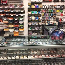 The Gaming Warehouse - Lots of collectible card game materials