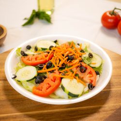House Salad: Lettuce, cucumbers, spinach, tomatoes, carrots and black olives