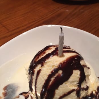 Outback Steakhouse - Scoop of ice cream with fudge - Steakhouses Near Me - Bayside, New York