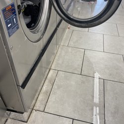 The Washing Well - Washer completely leaked out.