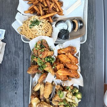 Fire Wings - Garlic Noodles, Fries; Dragon, Buffalo, Salt & Pepper, Lemon Pepper (clockwise order starting top left) - Chicken Wings Near Me - San Mateo, California Fire Wings - Garlic Noodles, Fries; Dragon, Buffalo, Salt & Pepper, Lemon Pepper (clockwise order starting top left) - Chicken Wings Near Me - San Mateo, California