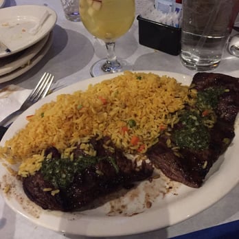 Boca Juniors Restaurant - Skirt steak with chimi-churri sauce (the green sauce on top of the steak). - Argentine Near Me - Elmhurst, New York Boca Juniors Restaurant - Skirt steak with chimi-churri sauce (the green sauce on top of the steak). - Argentine Near Me - Elmhurst, New York