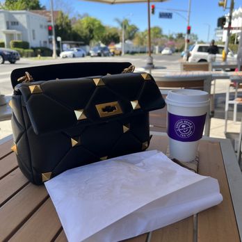 The Coffee Bean & Tea Leaf - a cup of coffee and a purse - Coffee & Tea Near Me - Los Angeles, California The Coffee Bean & Tea Leaf - a cup of coffee and a purse - Coffee & Tea Near Me - Los Angeles, California
