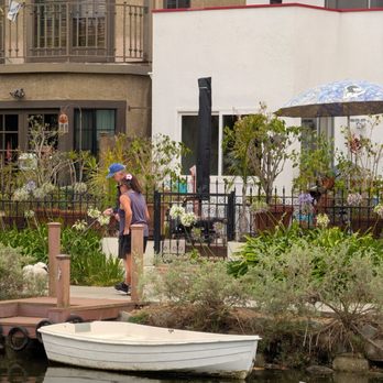 Venice Canals - Small boats parked all along the neighborhood - Landmarks & Historical Buildings Near Me - Venice, California Venice Canals - Small boats parked all along the neighborhood - Landmarks & Historical Buildings Near Me - Venice, California