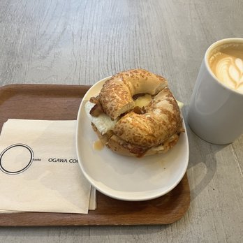 Ogawa Coffee - Egg, Bacon, and Cheese Sandwich on Asiago Bagel and a large caramel latte - Coffee & Tea Near Me - Boston, Massachusetts Ogawa Coffee - Egg, Bacon, and Cheese Sandwich on Asiago Bagel and a large caramel latte - Coffee & Tea Near Me - Boston, Massachusetts
