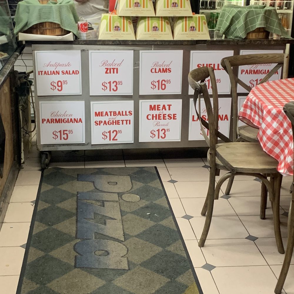 Tony's Brooklyn Pizza - a man behind a counter - Pizza Near Me - Brooklyn, New York Tony's Brooklyn Pizza - a man behind a counter - Pizza Near Me - Brooklyn, New York