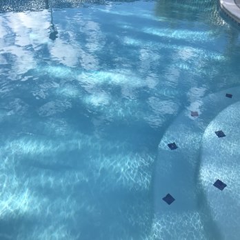 Trinity Custom Pools - This my pool.  A light blue plaster and Trinity Custom Pools put the tiles in on the steps at no extra charge - Pool & Hot Tub Service Near Me - Riverside, California