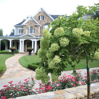 Master Landscaping Sprinklers - the front of a house - Landscaping Near Me