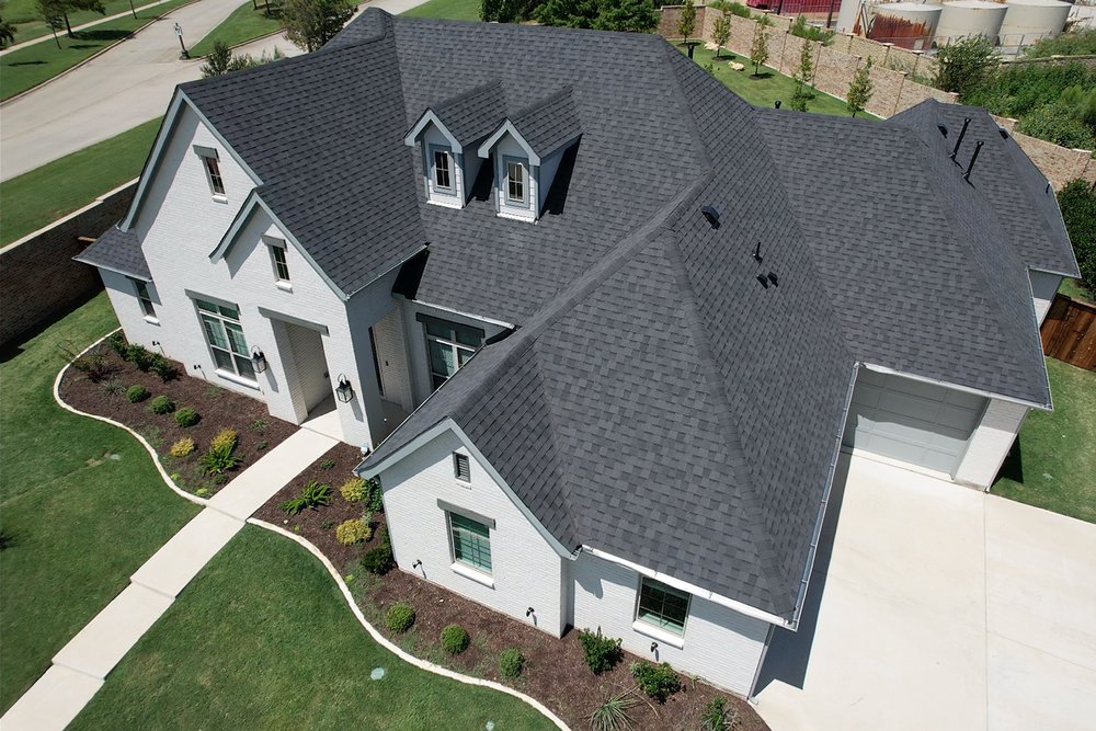 Slide of Storm Force Roofing + Construction