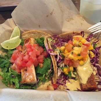 Fish District - Mahi taco on left, tuna with mango on right - Fish & Chips Near Me - Solana Beach, California Fish District - Mahi taco on left, tuna with mango on right - Fish & Chips Near Me - Solana Beach, California