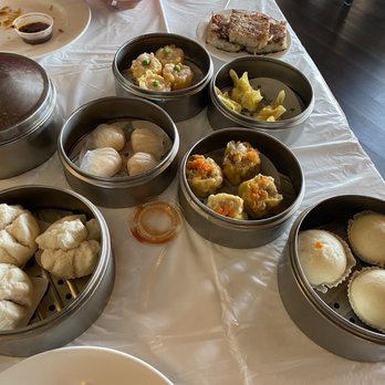 Shanghai Restaurant - Pork short ribs (covered). Pork buns.  Shu mai.  Hargau. Taro cakes.  Custard buns. - Dim Sum Near Me - Austin, Texas