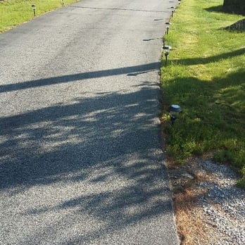 TM&M Services - a paved driveway in a residential area - Landscaping Near Me TM&M Services - a paved driveway in a residential area - Landscaping Near Me
