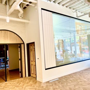The Desenberg - Large projection screen and the doors to another cocktail or meeting area - Venues & Event Spaces Near Me - Kalamazoo, Michigan The Desenberg - Large projection screen and the doors to another cocktail or meeting area - Venues & Event Spaces Near Me - Kalamazoo, Michigan