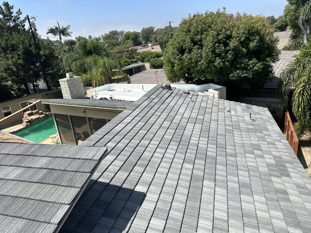 Slide of Twins Roofing