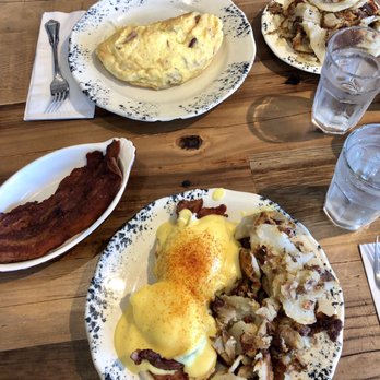 The Birch Door Cafe - Homestead Benedict with hollandaise instead of gravy, side of crispy bacon, and a Dubliner Omelette - Breakfast & Brunch Near Me - Bellingham, Washington The Birch Door Cafe - Homestead Benedict with hollandaise instead of gravy, side of crispy bacon, and a Dubliner Omelette - Breakfast & Brunch Near Me - Bellingham, Washington
