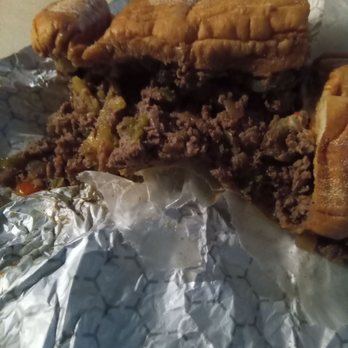 A Taste of Philly - Steak and cheese with provolone, peppers, and tomatoes. - Cheesesteaks Near Me - Vidalia, Georgia A Taste of Philly - Steak and cheese with provolone, peppers, and tomatoes. - Cheesesteaks Near Me - Vidalia, Georgia