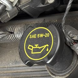 Precision Tire Factory & Auto Center Point S - Oil cap under the hood