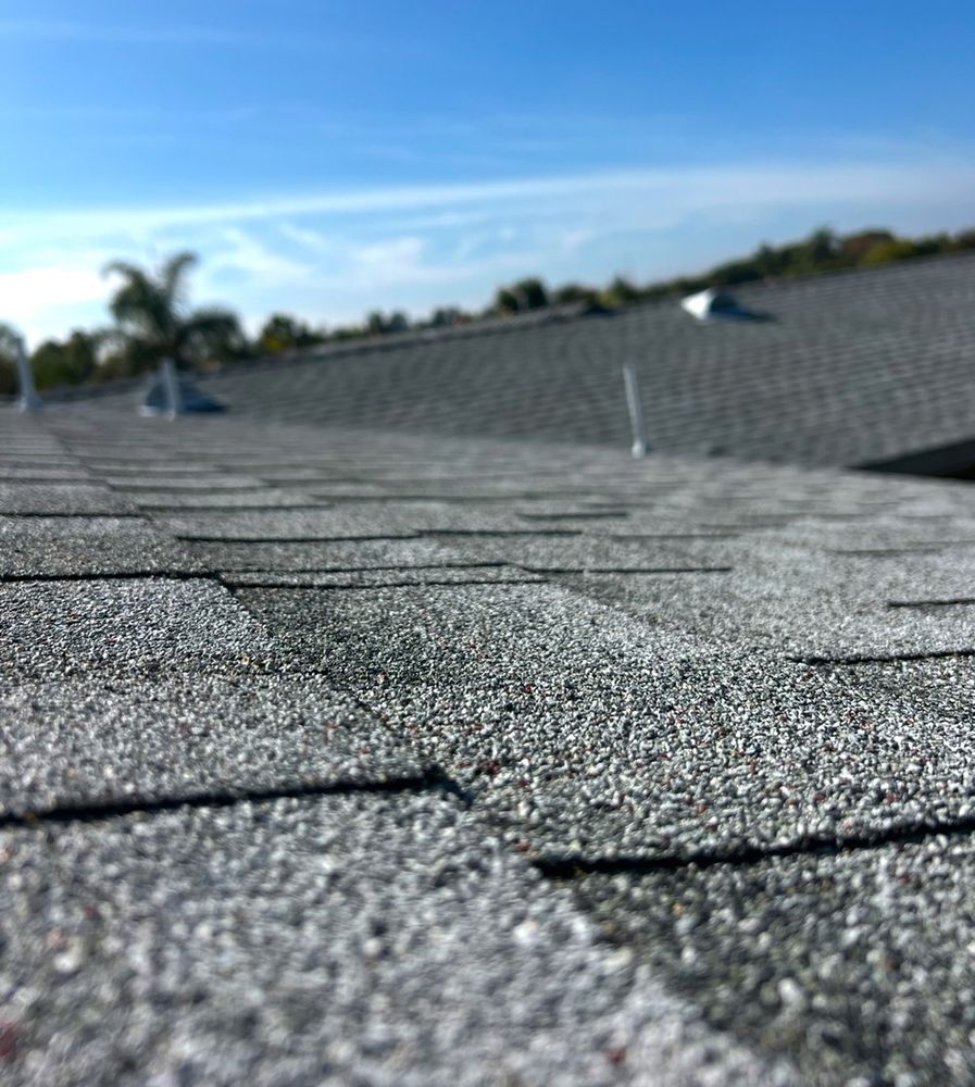 Slide of J.E.C. Roofing Inc.