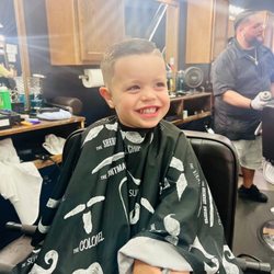 Elite Social Club Barbershop and Shave parlor - Craig does such an awesome job with my little man's cut!