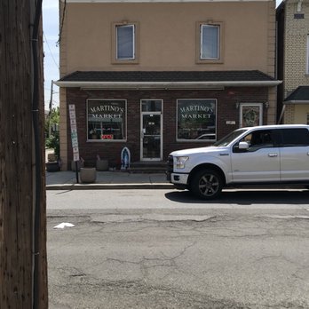 Martino's Grocery - a white truck parked in front of a store - Grocery Near Me - Hackensack, New Jersey Martino's Grocery - a white truck parked in front of a store - Grocery Near Me - Hackensack, New Jersey