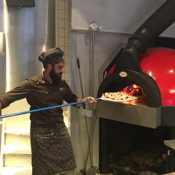 Pizza Heart - Our pizza going into the oven - Pizza Near Me - Amsterdam, New Hampshire Pizza Heart - Our pizza going into the oven - Pizza Near Me - Amsterdam, New Hampshire