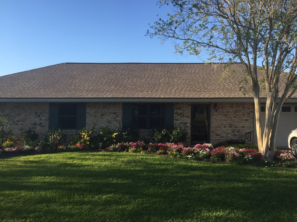 Slide of Ford Roofing Service