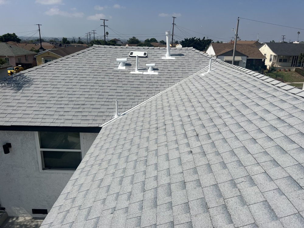 Slide of Twins Roofing