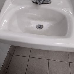 Walgreens - You have the products in the store to clean the sink with even some soap and hot water would do it some good