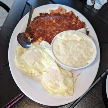Pete's Place - Corned beef hash with two eggs,grits and toast - American Near Me - West Palm Beach, Florida Pete's Place - Corned beef hash with two eggs,grits and toast - American Near Me - West Palm Beach, Florida