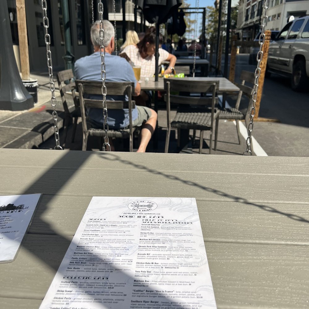 Squid Ink Eclectic Eats & Drinks - Table swings - Great Idea!!! - Gastropubs Near Me - Mobile, Alabama Squid Ink Eclectic Eats & Drinks - Table swings - Great Idea!!! - Gastropubs Near Me - Mobile, Alabama