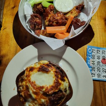 Reggies Music Joint - Baked Mac & Cheese &  8 Jumbo Sized Award Winning Wings (BBQ) - Music & DVDs Near Me - Chicago, Illinois