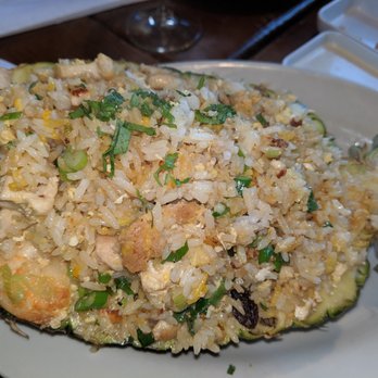 Riko - ~ Chaufa de Pina (Peruvian style fried rice w.chicken, shrimp, pineapple & raisins; served in half pineapple) - Peruvian Near Me - Sunnyside, New York Riko - ~ Chaufa de Pina (Peruvian style fried rice w.chicken, shrimp, pineapple & raisins; served in half pineapple) - Peruvian Near Me - Sunnyside, New York