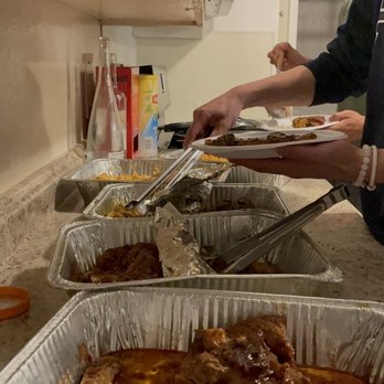 Cjs Jamaican Kitchen - a man preparing food - Caribbean Near Me - Stockton, California Cjs Jamaican Kitchen - a man preparing food - Caribbean Near Me - Stockton, California