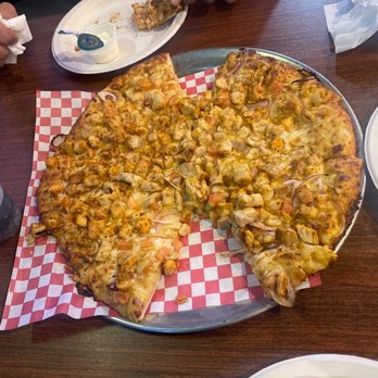 Large Butter Chicken Pizza.