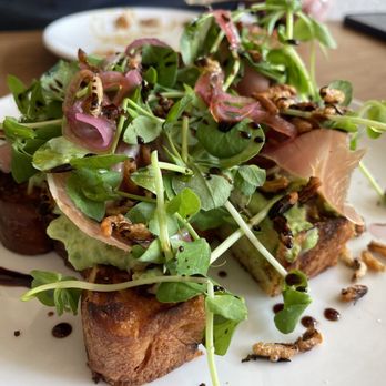 Modern Bird - Country ham toast with peas and ricotta (to die for) - New American Near Me - Traverse City, Michigan Modern Bird - Country ham toast with peas and ricotta (to die for) - New American Near Me - Traverse City, Michigan