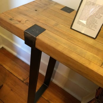 Artemisia - Great attention to detail with this wrap around flat metal legs. - Art Galleries Near Me - Geneva, Illinois