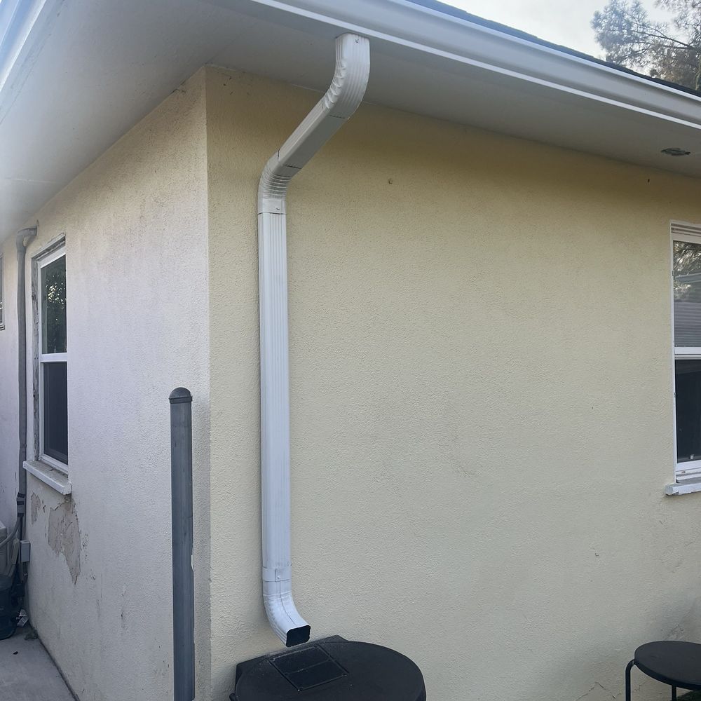 Supreme Seamless Rain Gutter Systems - End cap , downspout and 50 gallon barrel. - Gutter Services Near Me Supreme Seamless Rain Gutter Systems - End cap , downspout and 50 gallon barrel. - Gutter Services Near Me