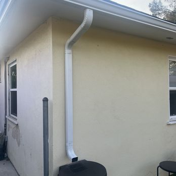 Supreme Seamless Rain Gutter Systems - End cap , downspout and 50 gallon barrel. - Gutter Services Near Me Supreme Seamless Rain Gutter Systems - End cap , downspout and 50 gallon barrel. - Gutter Services Near Me