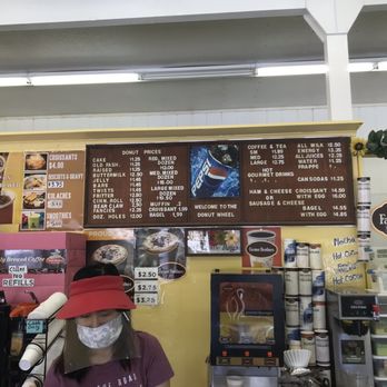 Donut Wheel - a woman wearing a mask and a red hat - Donuts Near Me - Quincy, California Donut Wheel - a woman wearing a mask and a red hat - Donuts Near Me - Quincy, California