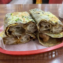 Asian Snack - Chinese pancake with fried dough.